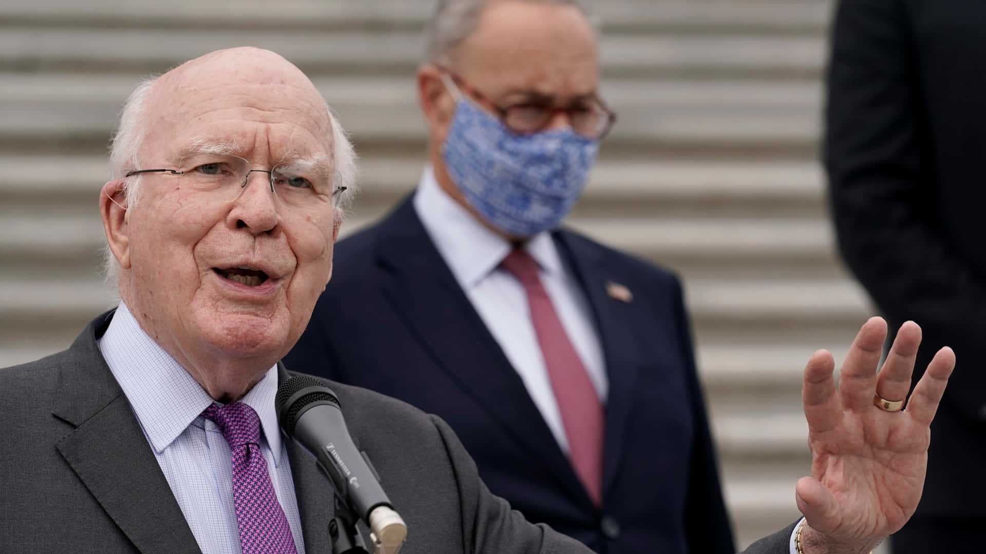 Senator Patrick Leahy Delivering A Passionate Speech Background