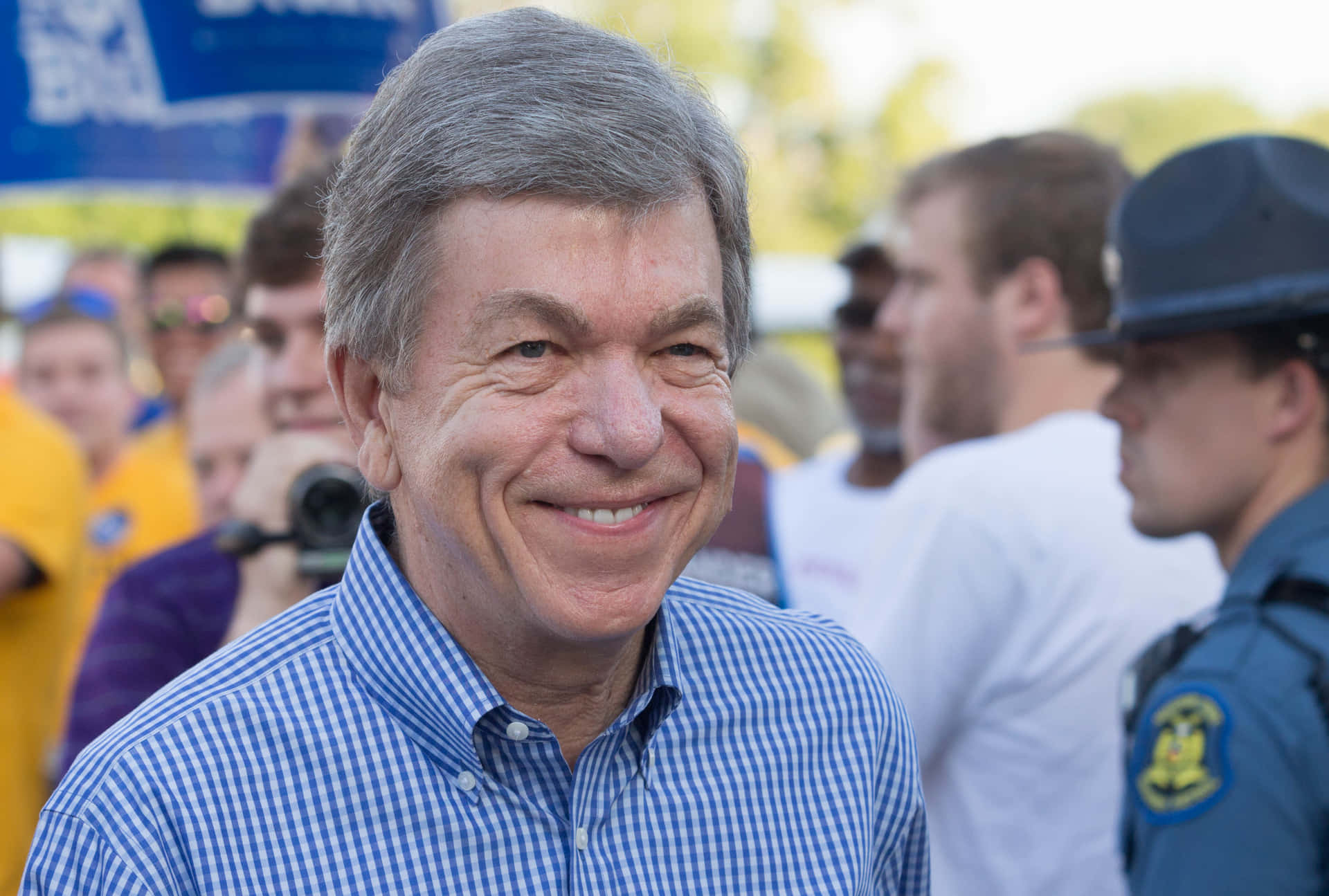 Senator Roy Blunt Flaunting His Warm Smile Outdoors Background