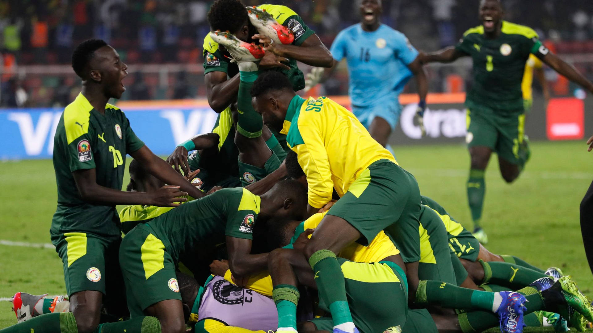 Senegal Football Team On Field Background