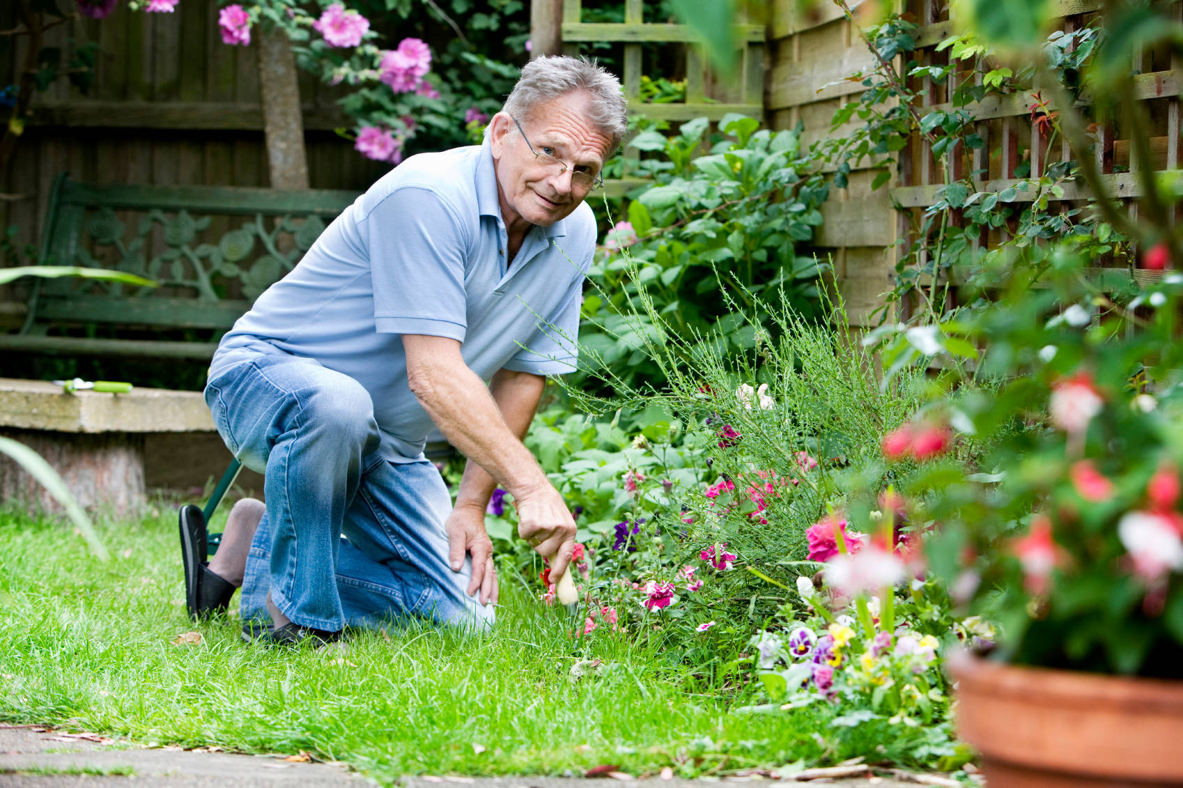 Senior Man Flower Gardening Background