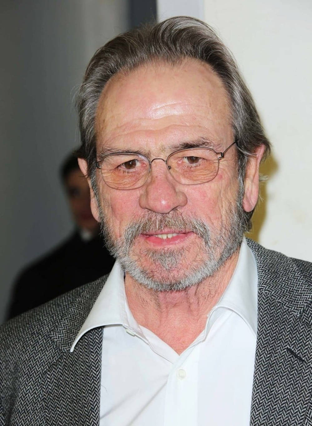 Seniorly Handsome Tommy Lee Jones Background