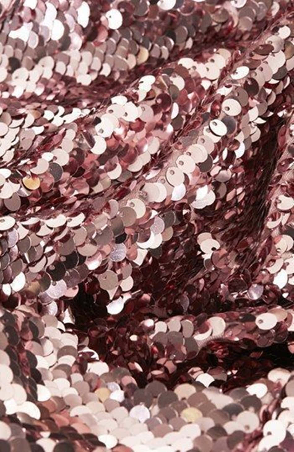 Sequin Fabric In A Pink Color Background
