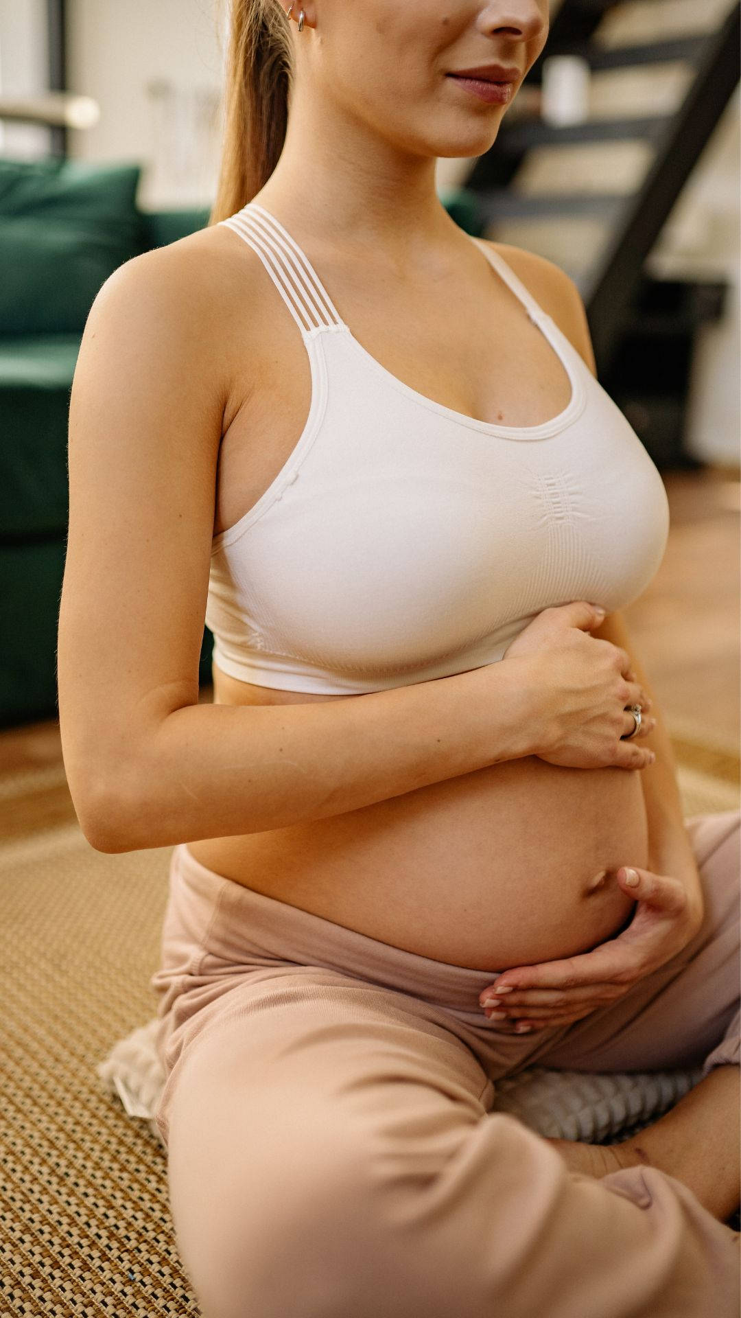 Serene Expectant Mother Lovingly Touching Her Baby Bump