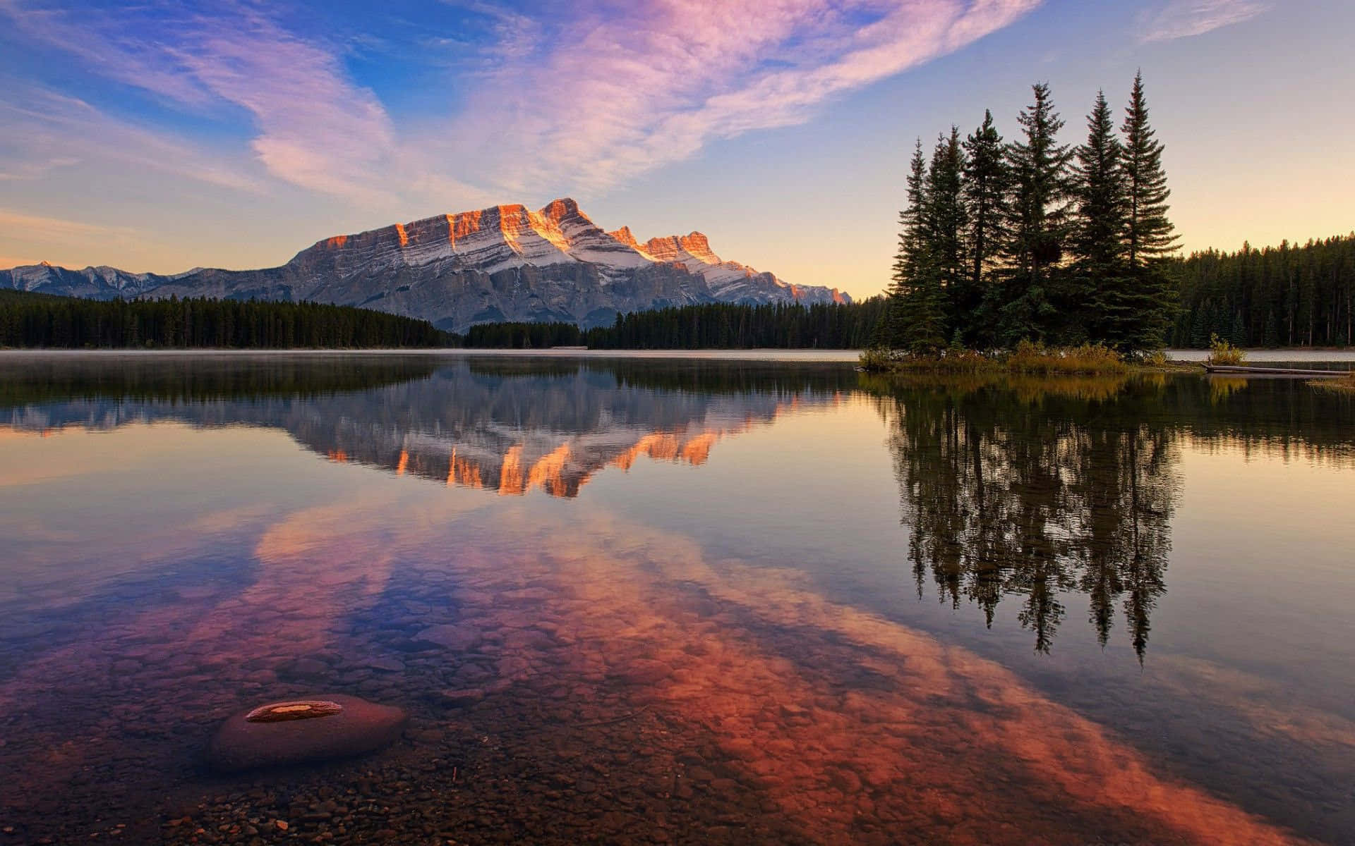 Serene Glacial Lake At Dawn Background