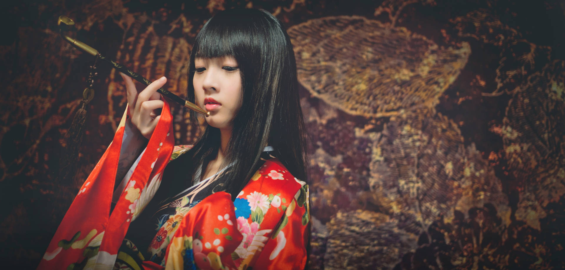 Serene Japanese Girl Enjoying A Pipe