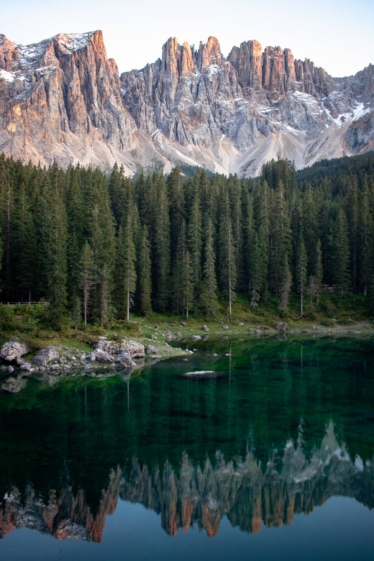 Serene Lake Carezza In Italy Background