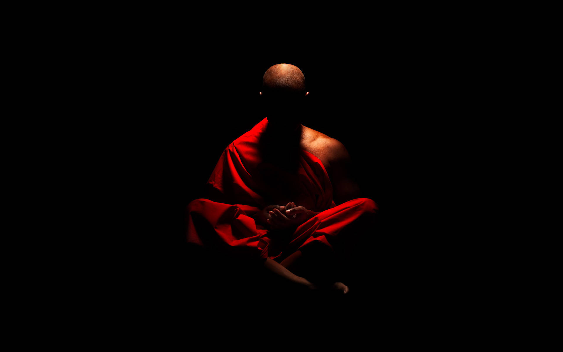 Serene Monk In Meditation Background