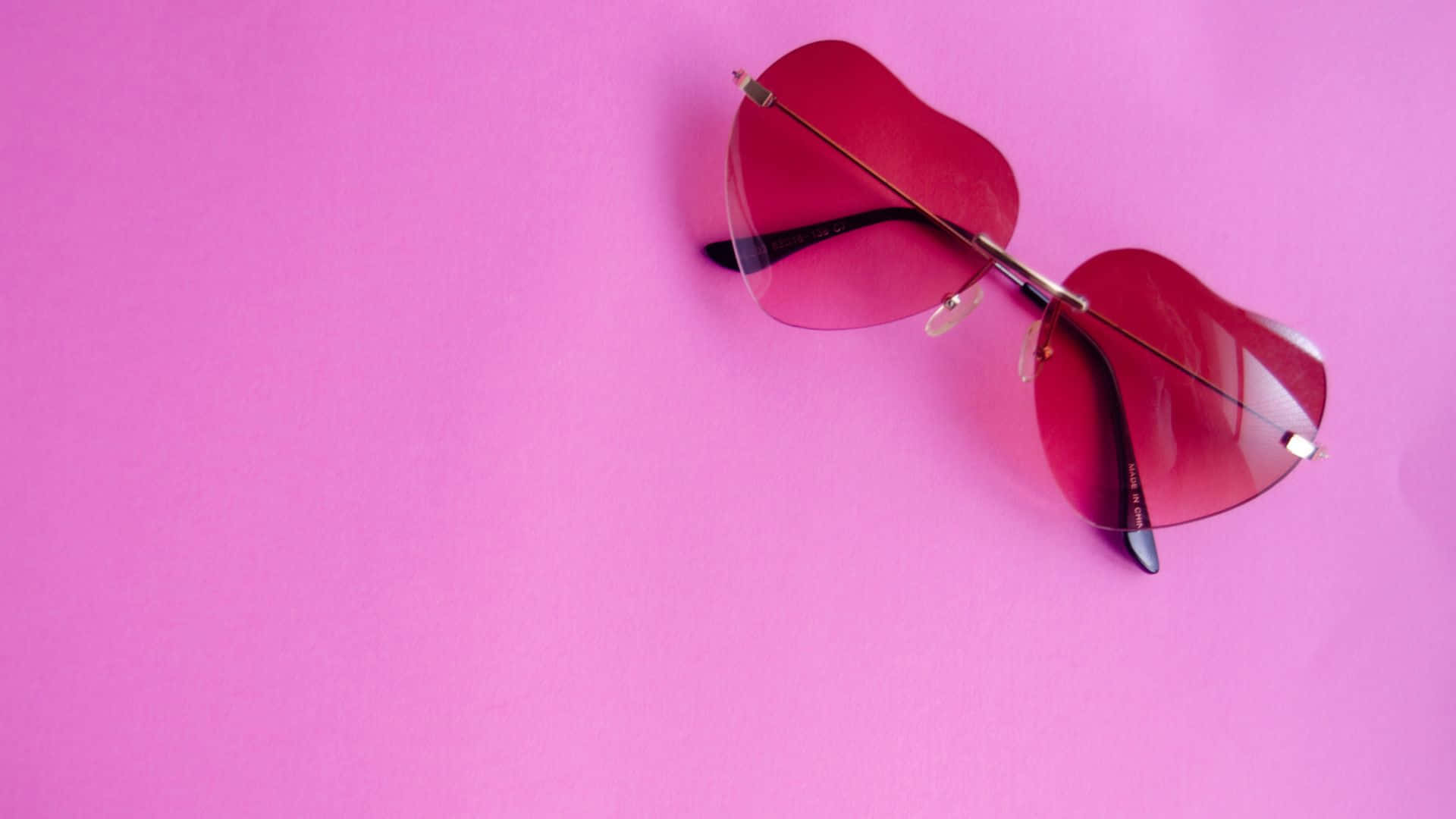 Serene Mountainscape Reflecting On Calm Turquoise Lake Background