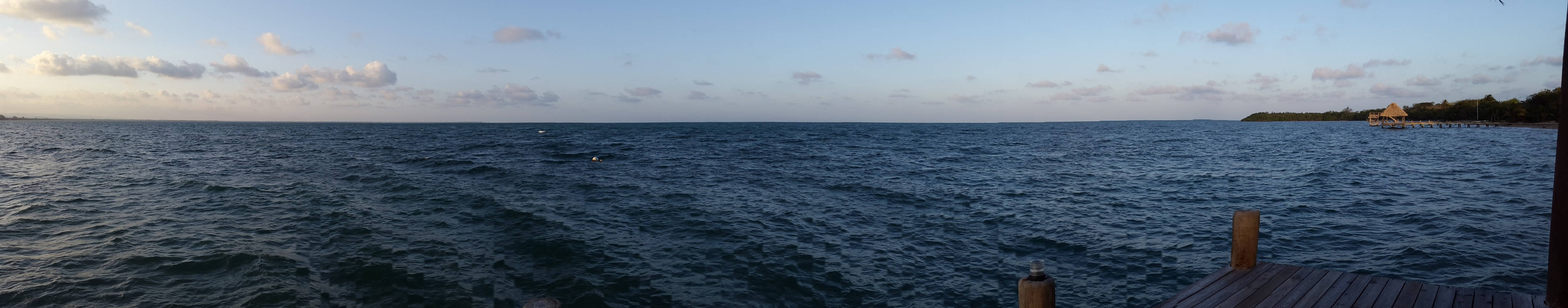 Serene Ocean View From A Pier Background