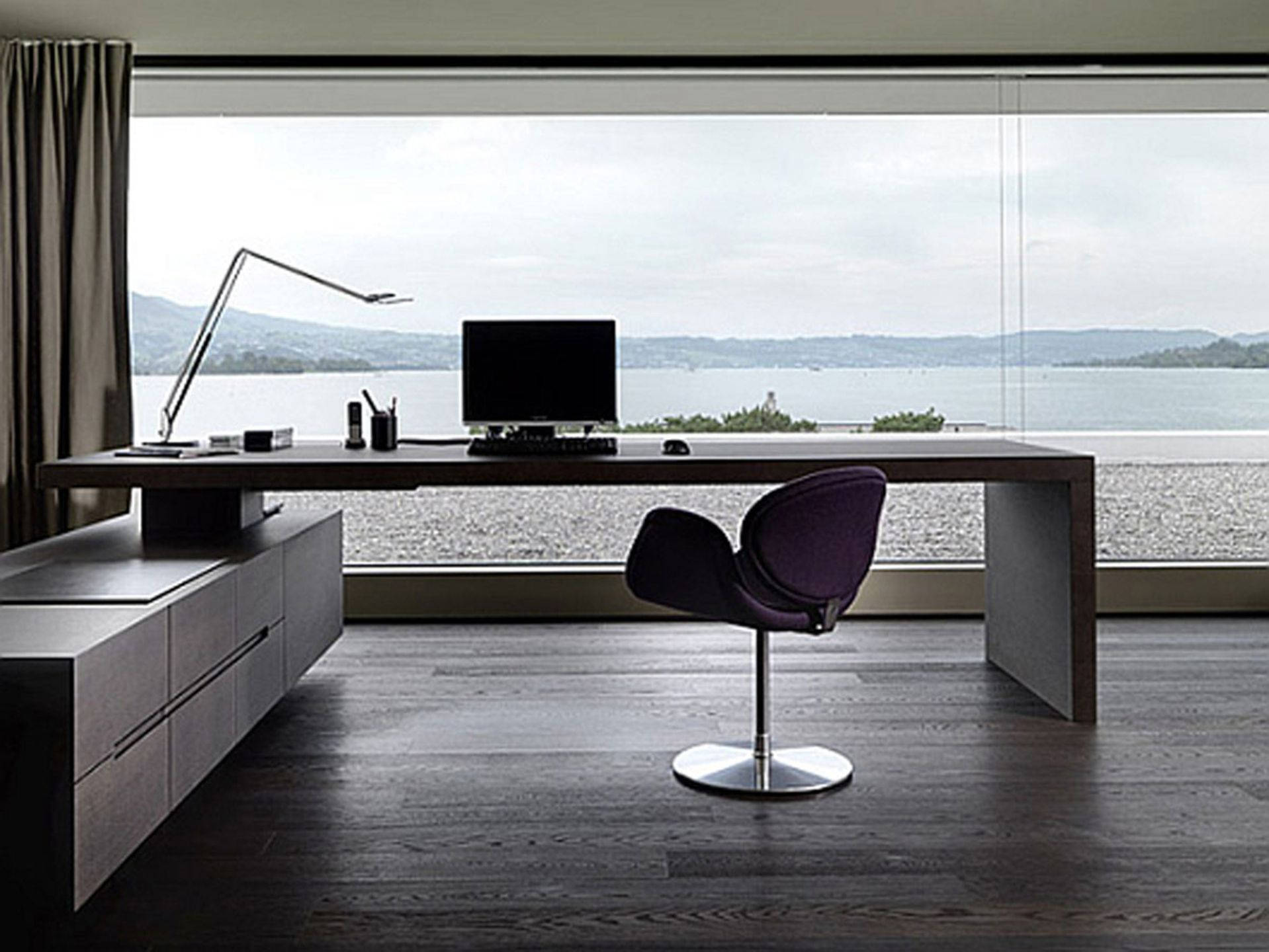 Serene Office Set-up Overlooking The Coastline