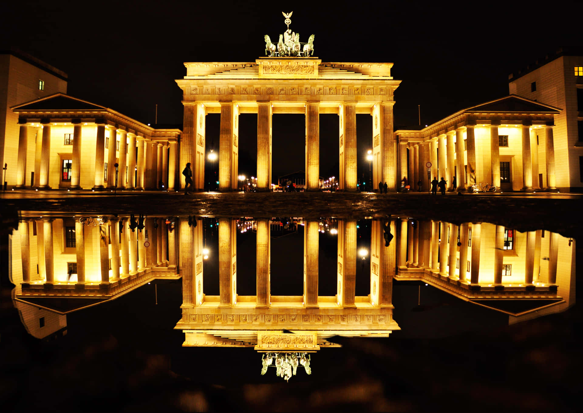 Serene Reflection Of The Brandenburg Gate Background