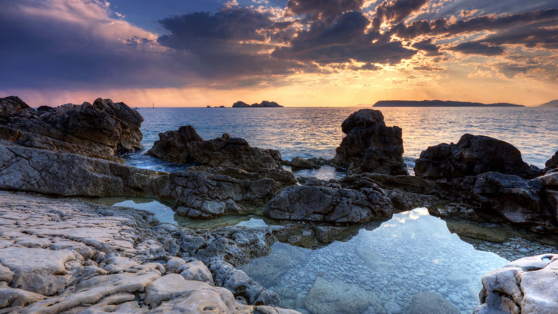 Serene Rocky Beach Background
