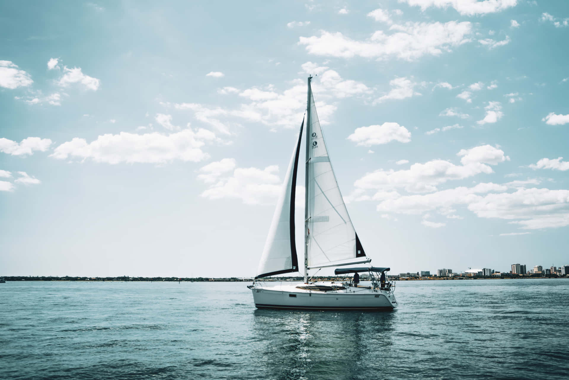 Serene Sailing At Sunset