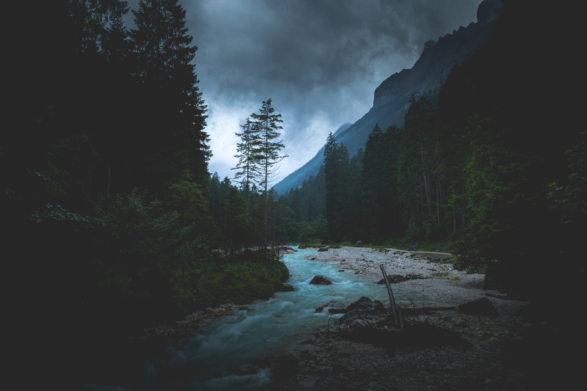 Serene Scene Of A Lake Nestled In The Mountains At Dawn