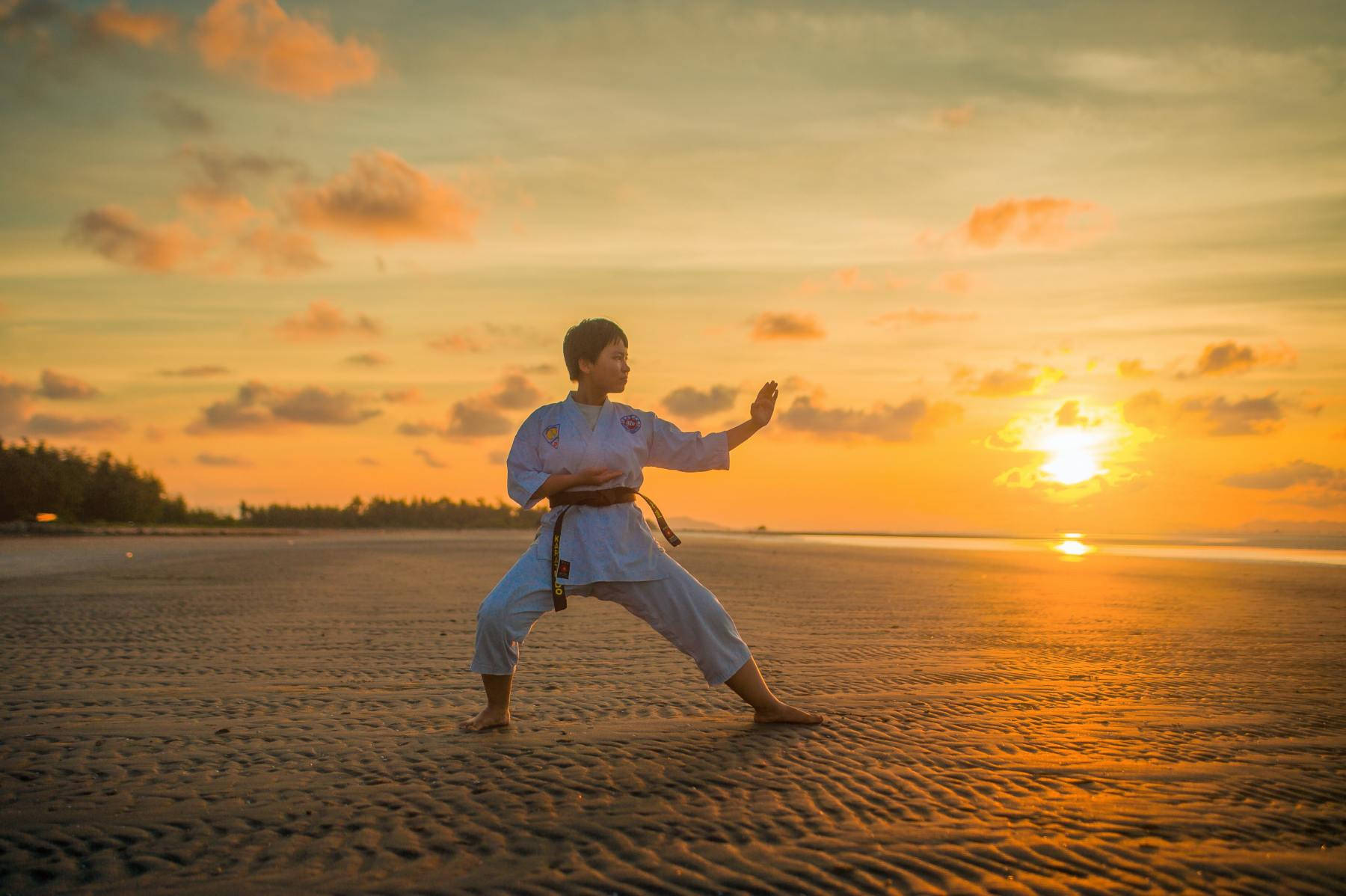 Serene Tai Chi Practice At Sunset. Background