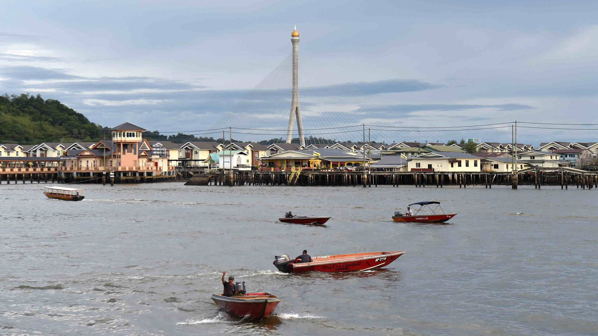 Serene View Of Boats On The Brunei River Background