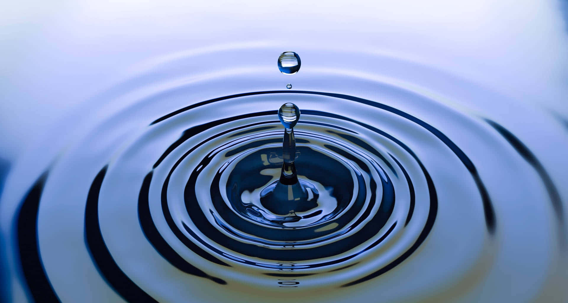 Serene Water Drop Ripple Background Background
