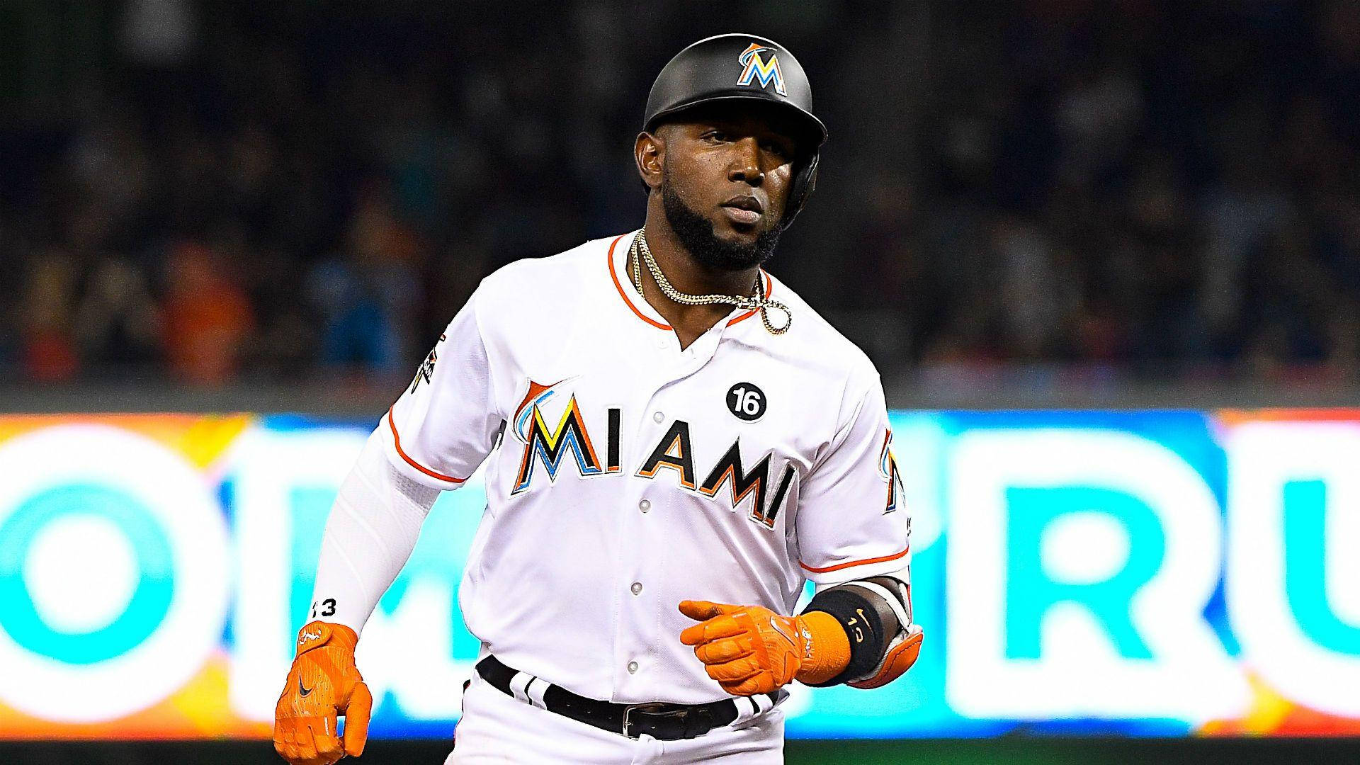 Serious Marcell Ozuna With Bright Billboard