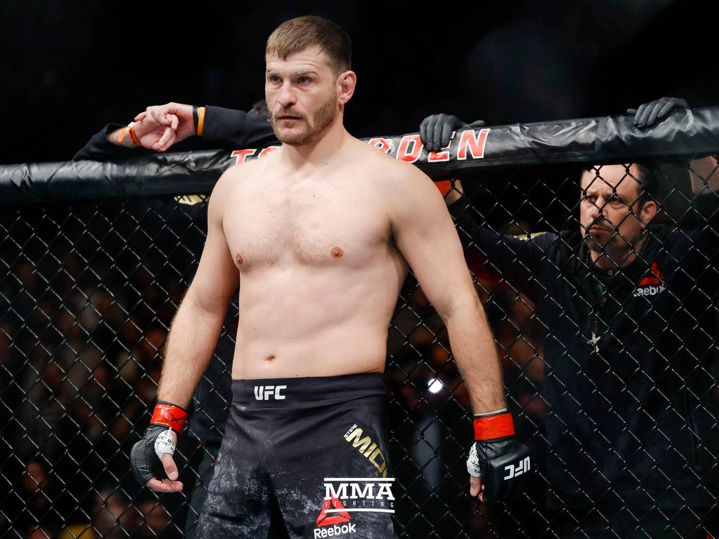 Serious Stipe Miocic On Octagon Background