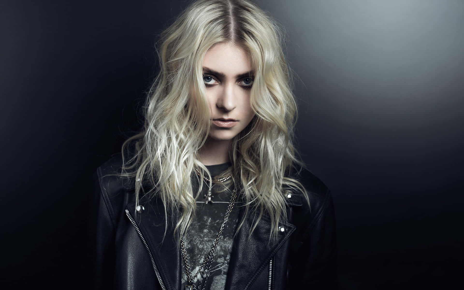 Serius Face Of The Singer Of The Pretty Reckless Band Background