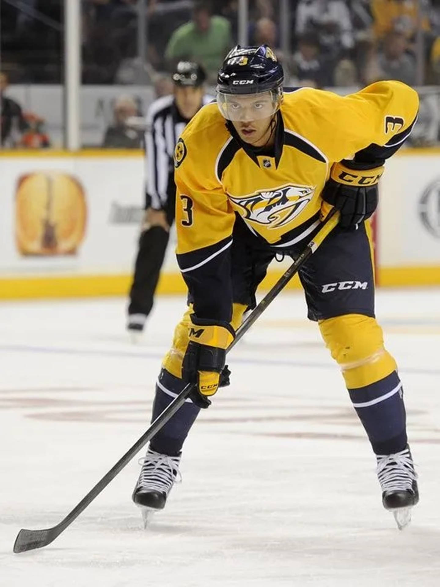 Seth Jones Leaning Forward With Hockey Stick Background