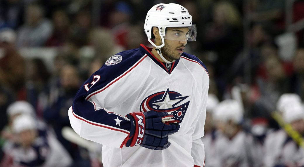 Seth Jones Squeezing Jersey With Right Hand Background