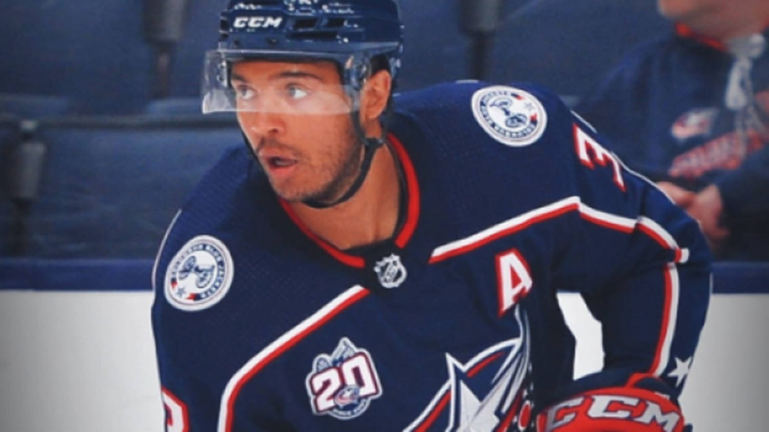 Seth Jones With Mouth Open Looking To The Right Background