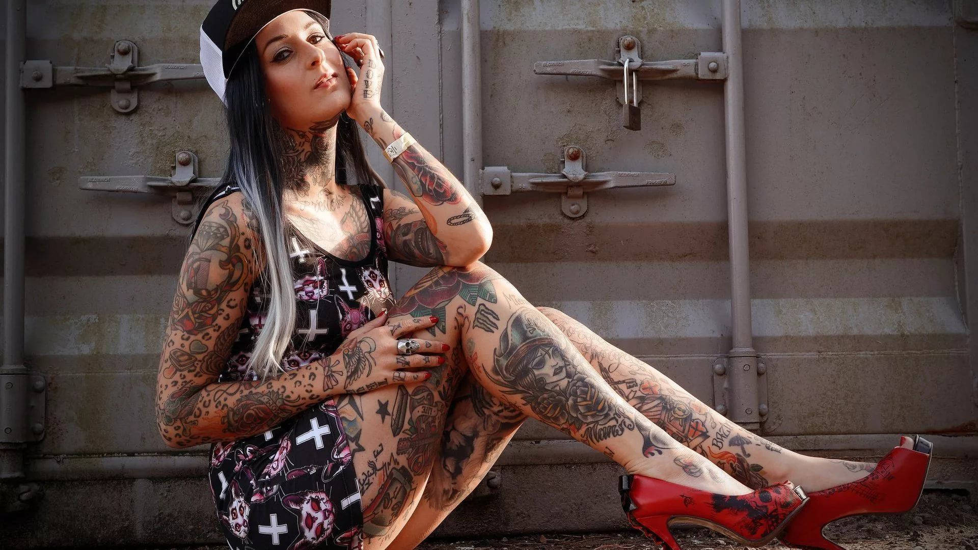 Sexy Woman With Tattoos Background