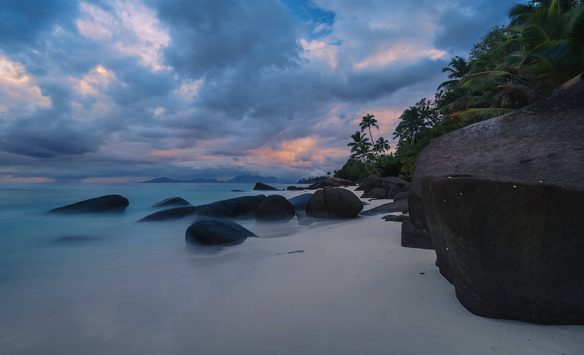 Seychelles Beachfront Rocks Background