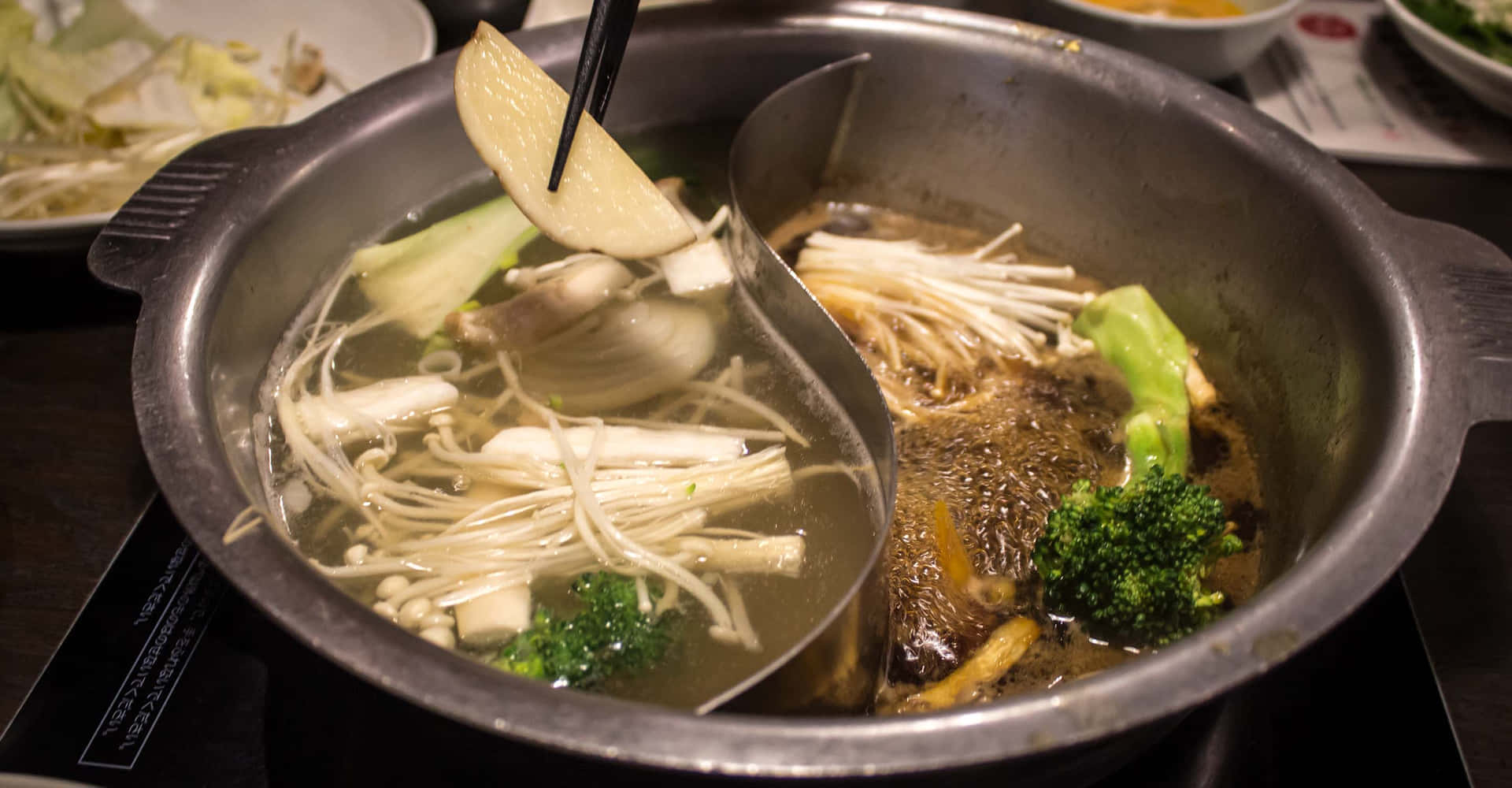 Shabu-shabu In A Dual Stainless Steel Hot Pot Background