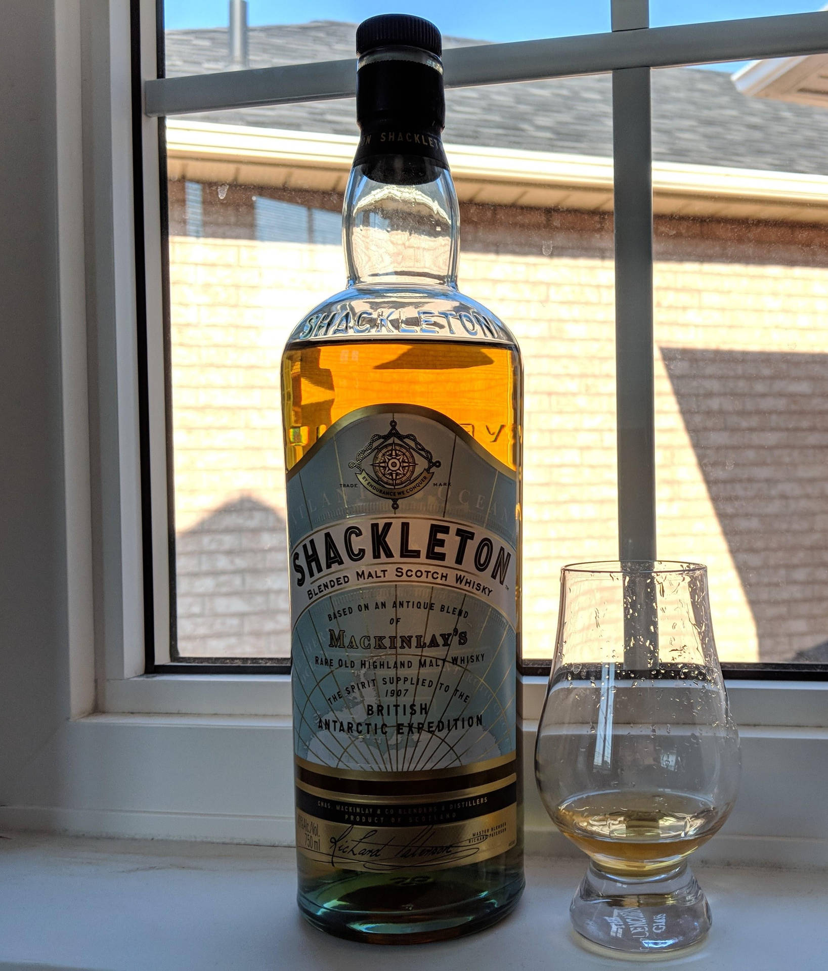 Shackleton Scotch Whiskey Bottle Against Window Background