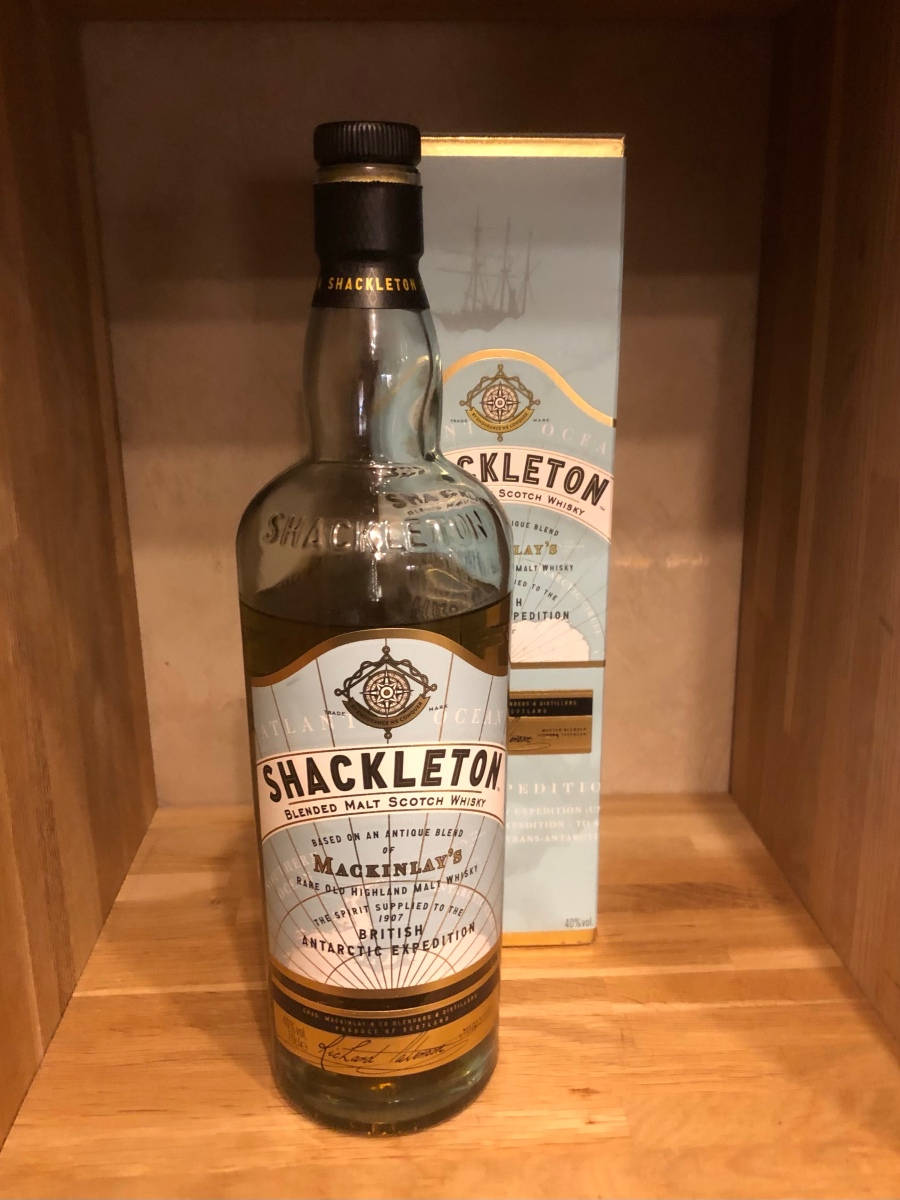 Shackleton Scotch Whiskey On A Shelf Background