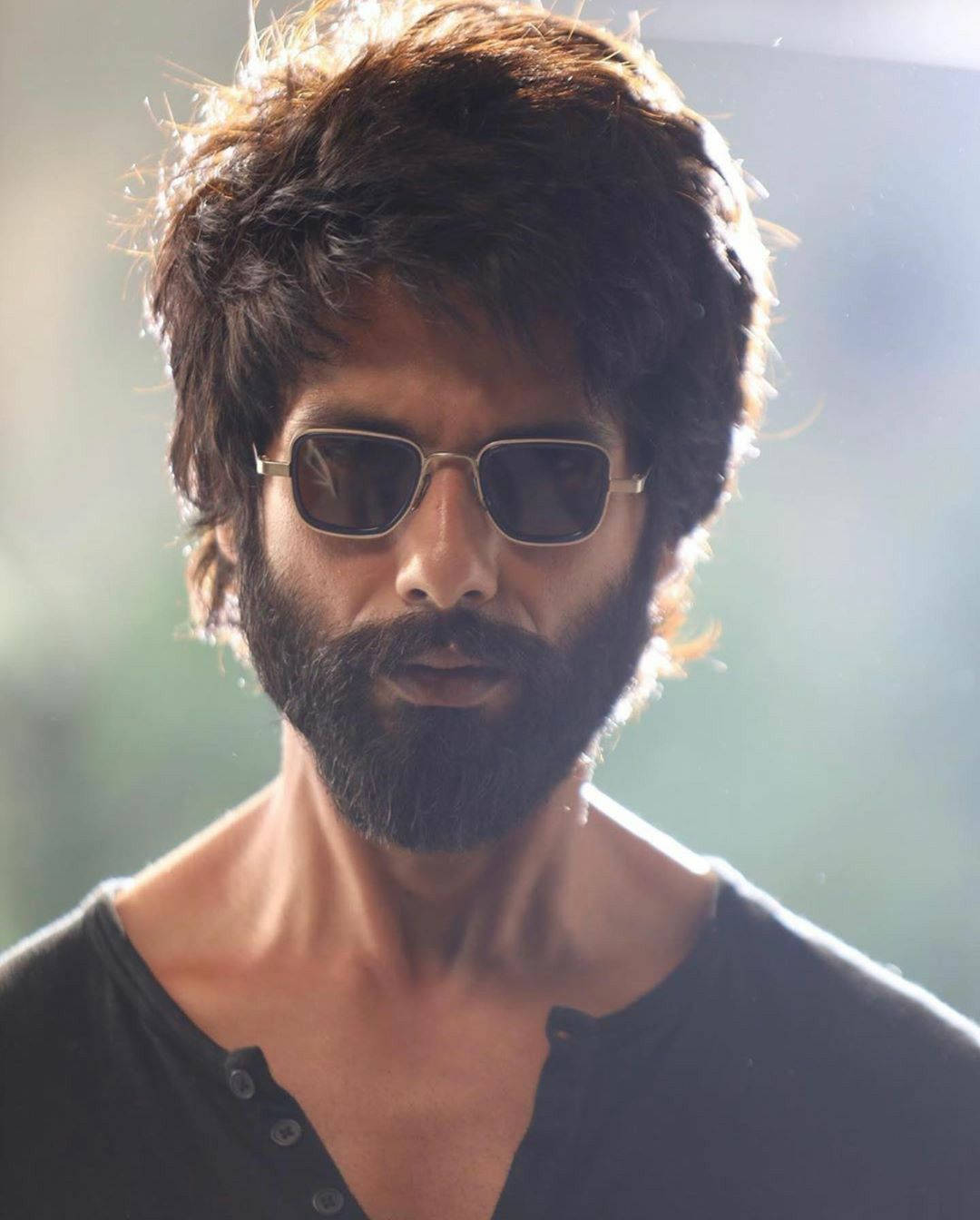 Shahid Kapoor Flaunting His Style With Shades Background
