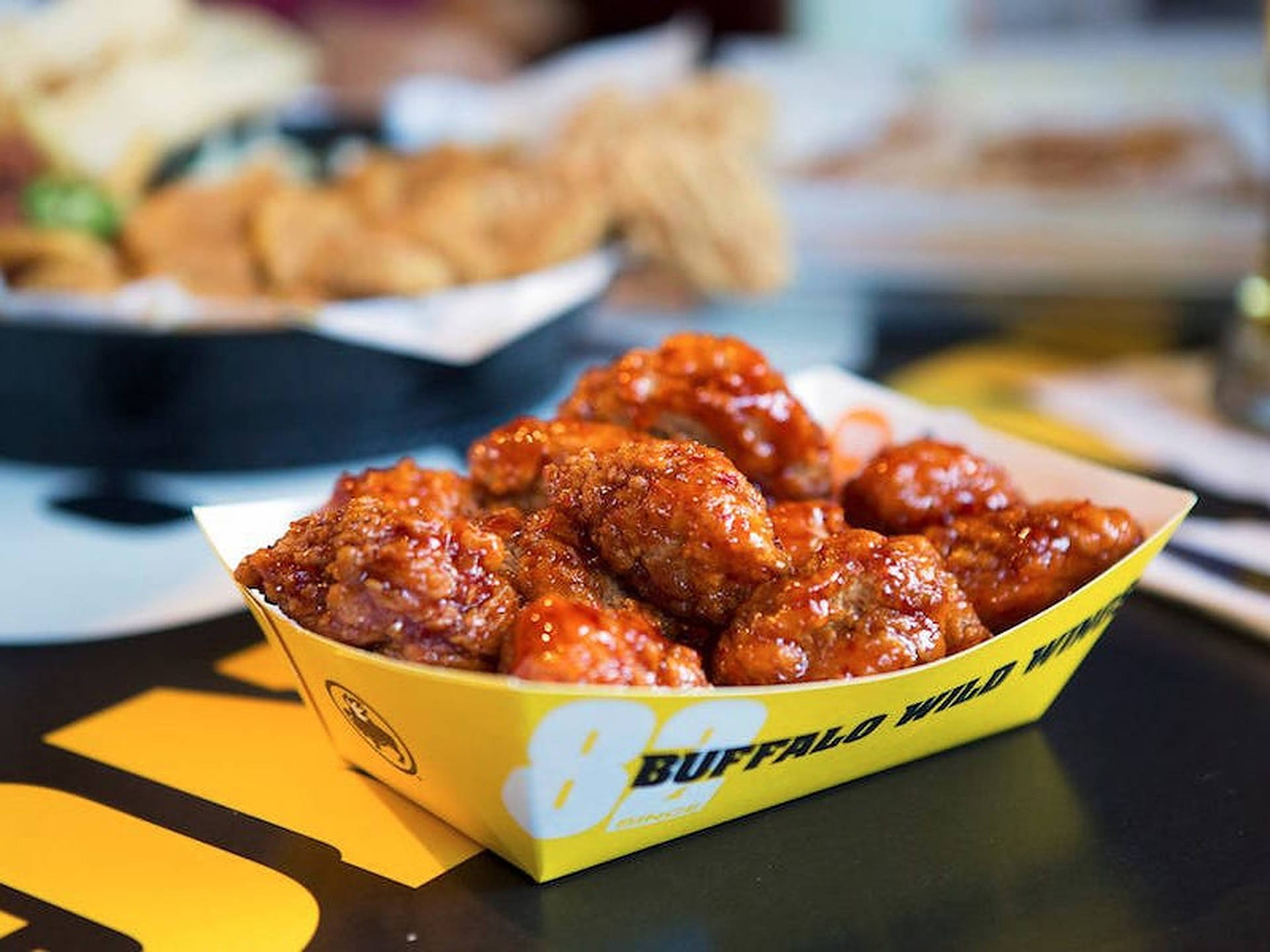 Shallow Focus Buffalo Wild Wings Background