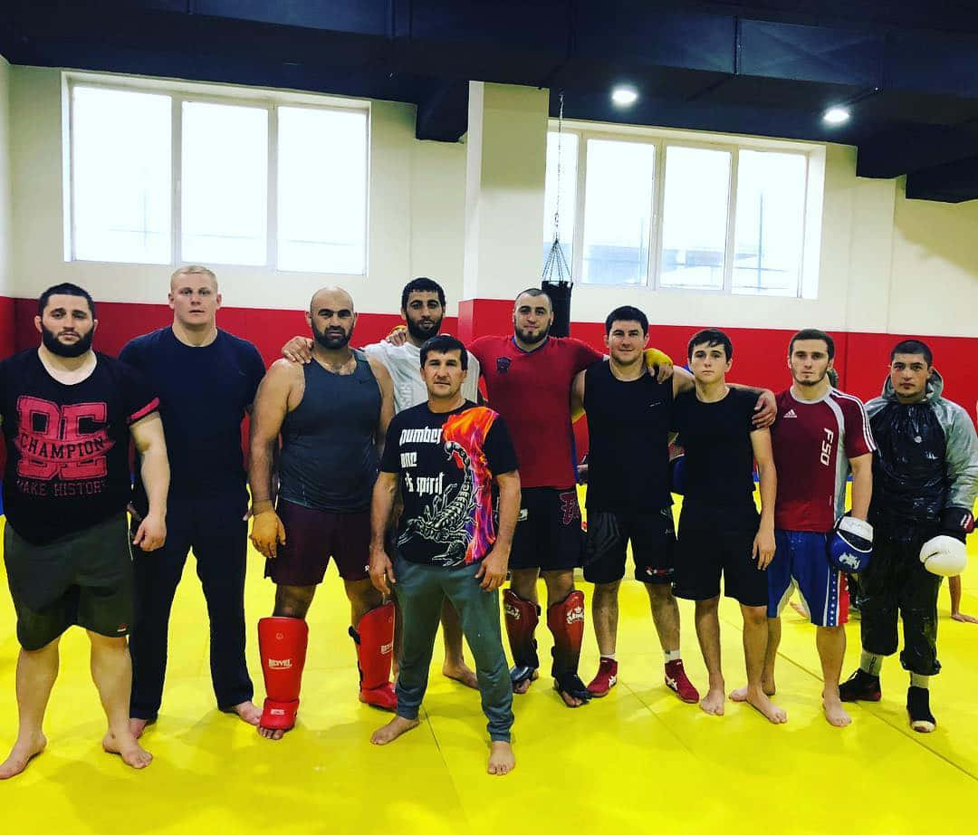 Shamil Abdurakhimov And Friends With Serious Faces Background