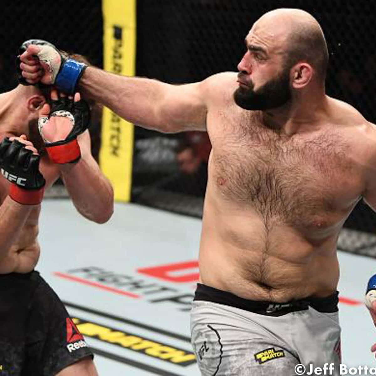 Shamil Abdurakhimov Doing A Spinning Back Fist Background