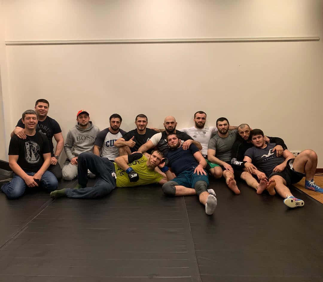 Shamil Abdurakhimov Sitting On Floor With Friends
