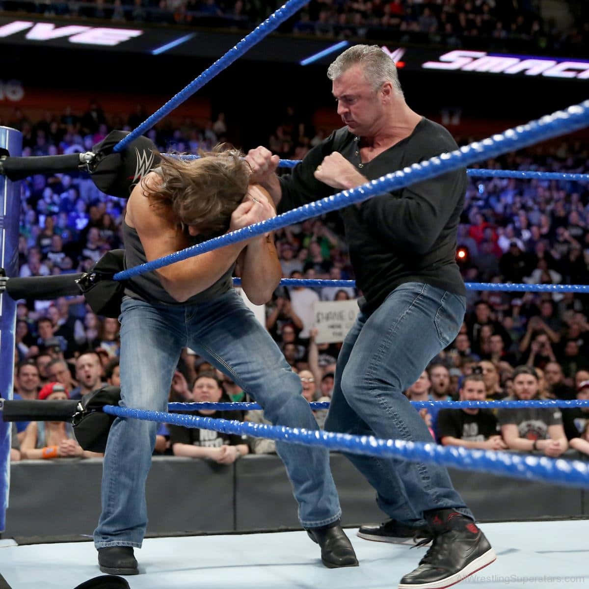 Shane Mcmahon Fighting Aj Styles Background