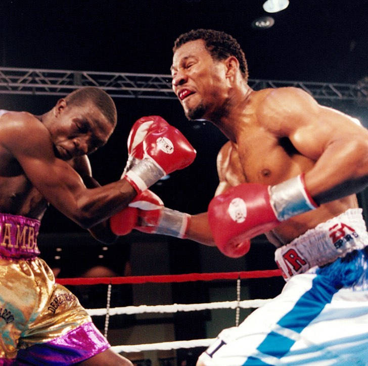 Shane Mosley Trading Blows Background