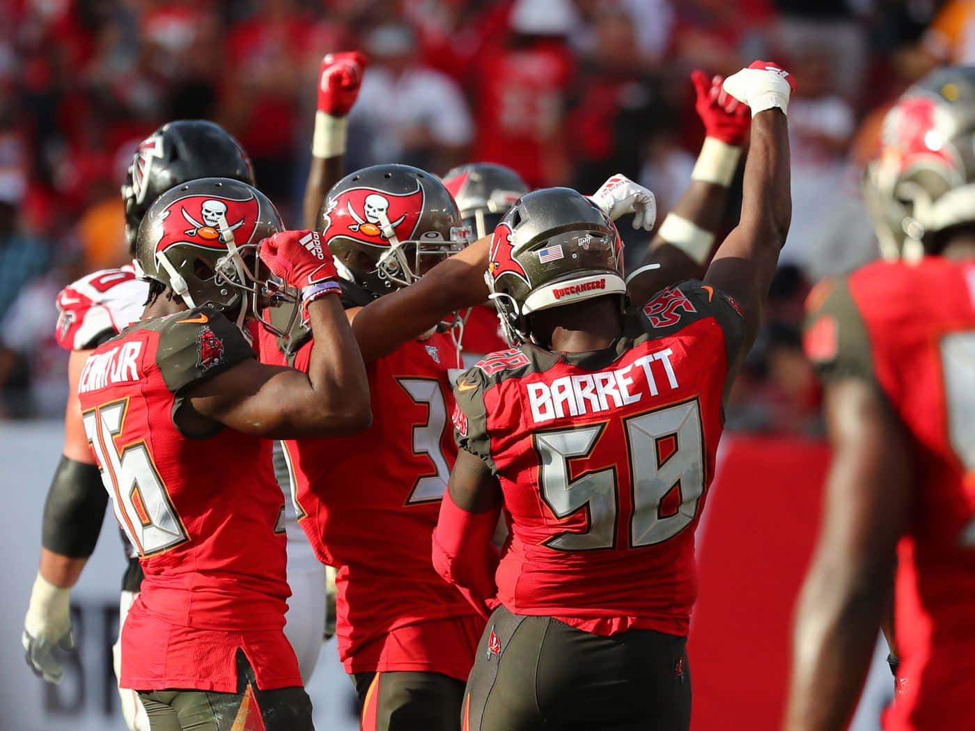 Shaquil Barrett Dancing With Teammates Background