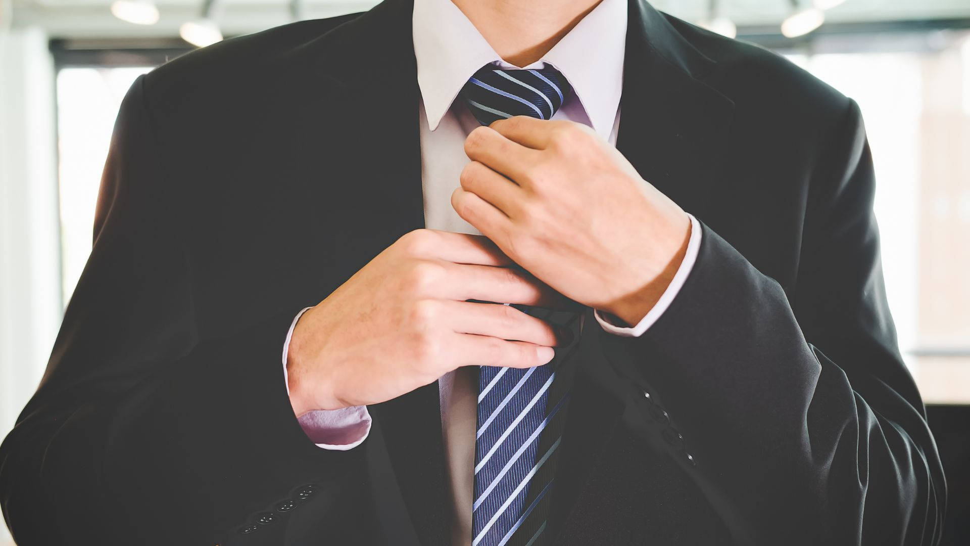 Sharp Looking Young Adult In A Formal Business Suit