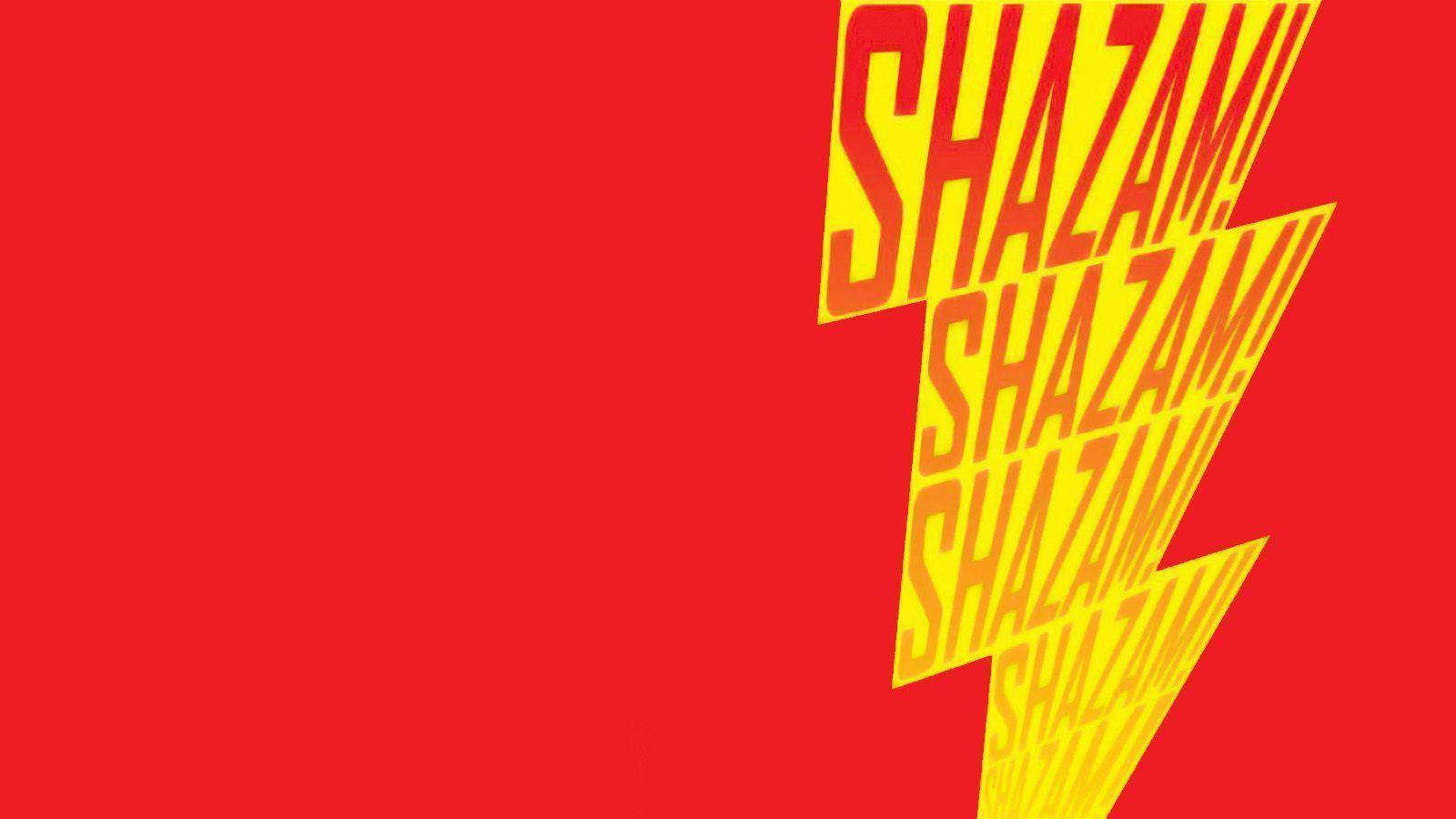Shazam Superhero Logo Illuminated Against Dark Background