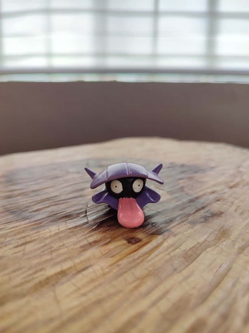 Shellder Toy On Table Background