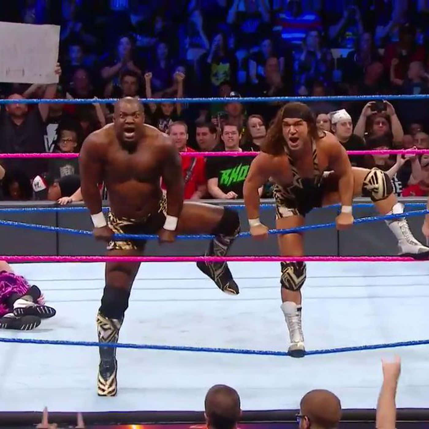 Shelton Benjamin And Chad Gable In The Heat Of A Fatal 4-way Match Background