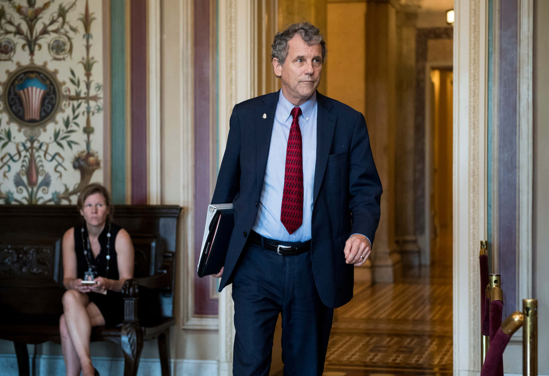 Sherrod Brown Entering His Office Background