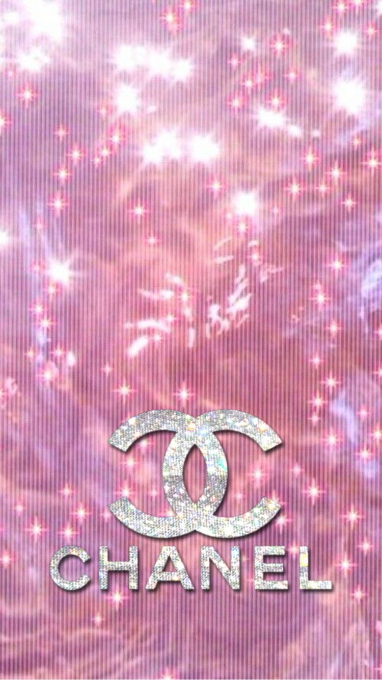 Shimmering Silk Fabric With Pink Chanel Logo Background