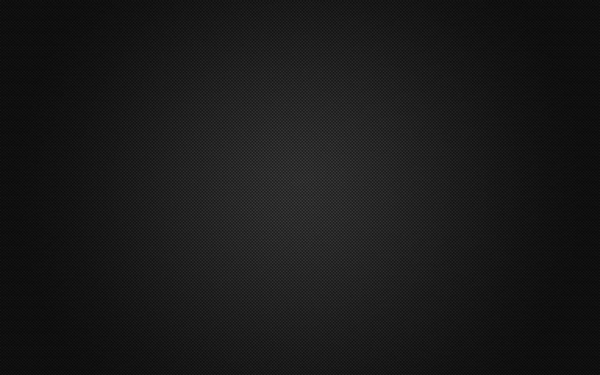 Shine In The Darkness With Black Carbon Fiber Background