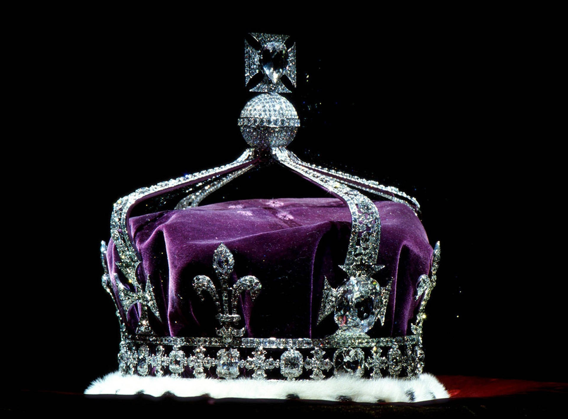 Shine Like A Diamond With This Stunning Crown Of Jeweled Purple Diamonds Background