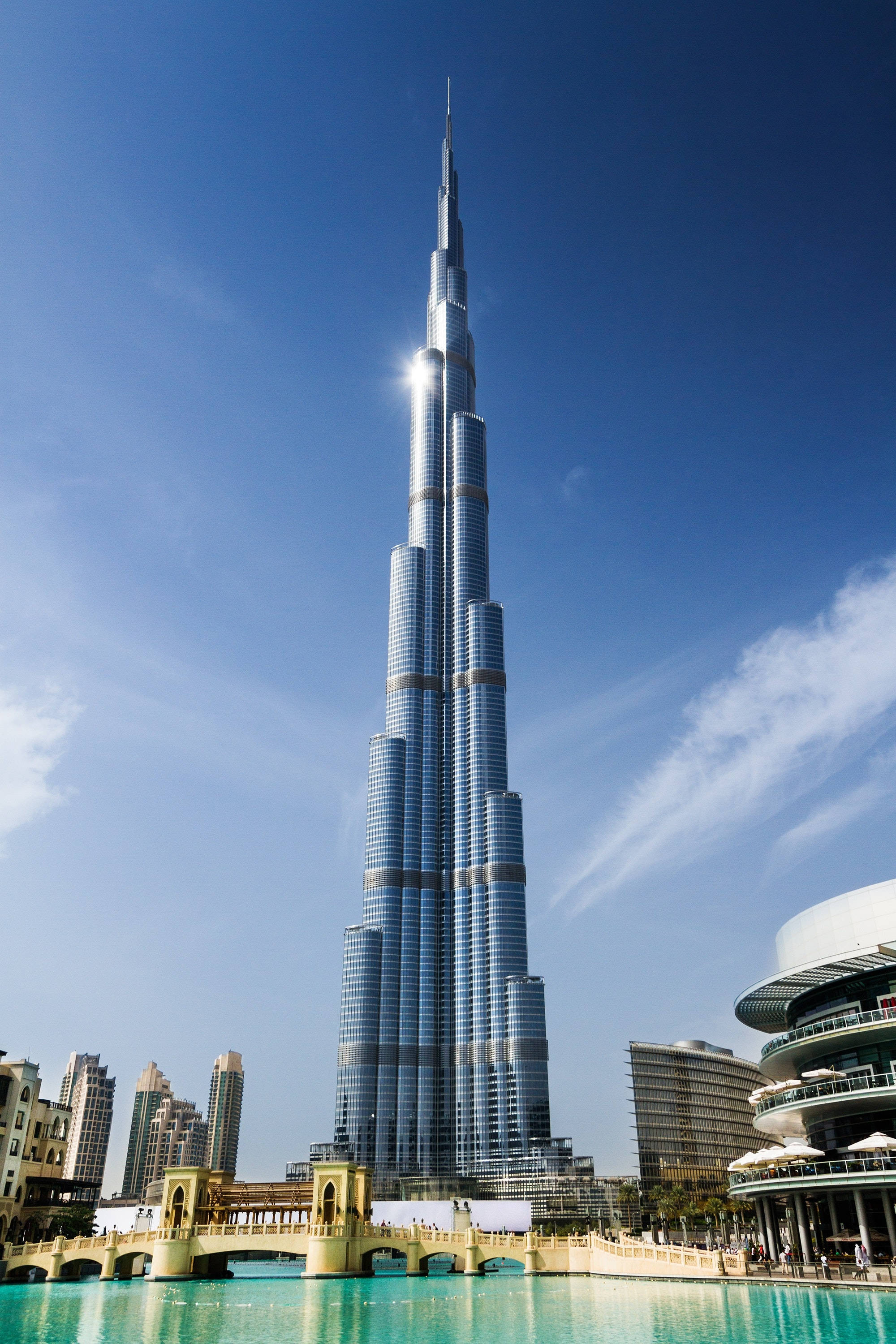 Shining Burj Khalifa Under The Sun Background