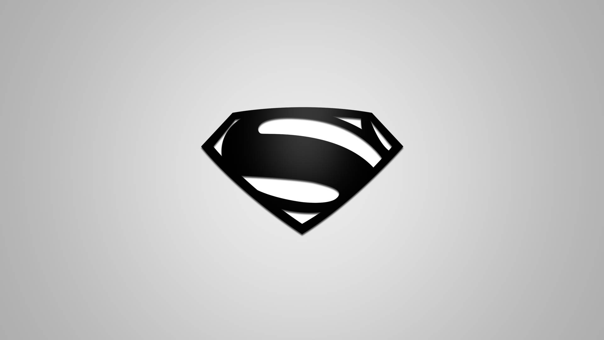 Shiny Black On White Superman Logo Background